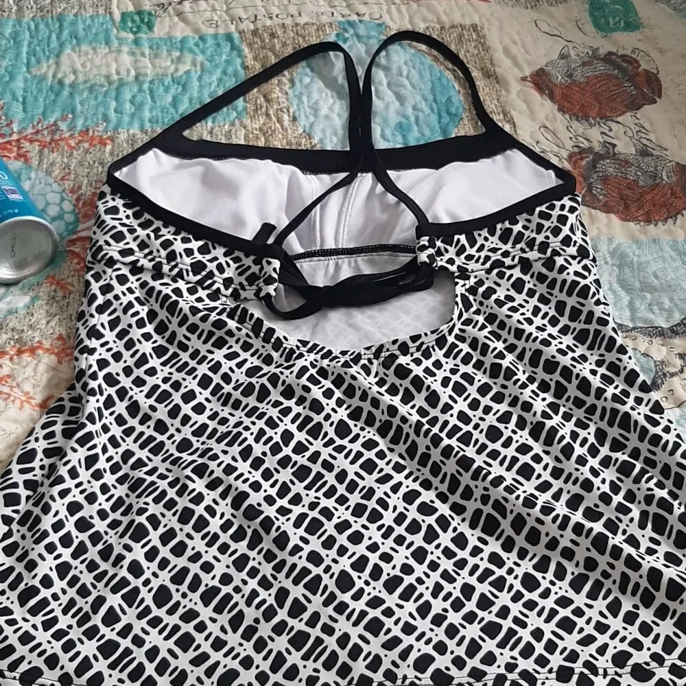 Nike bathing suit top, black and white with aqua trim.